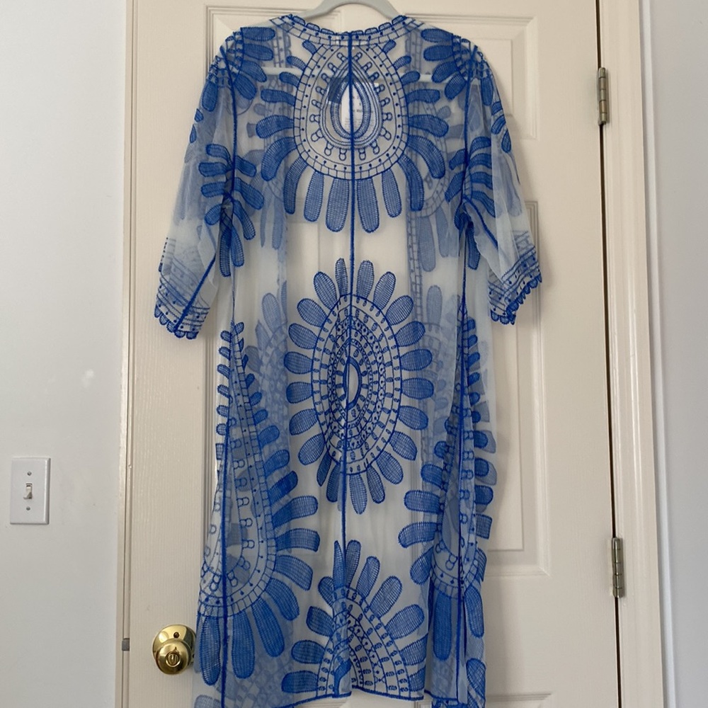 Beautiful sheer cover up.